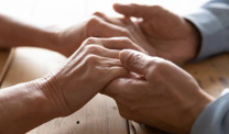 Close-up of couple man and woman holding hands