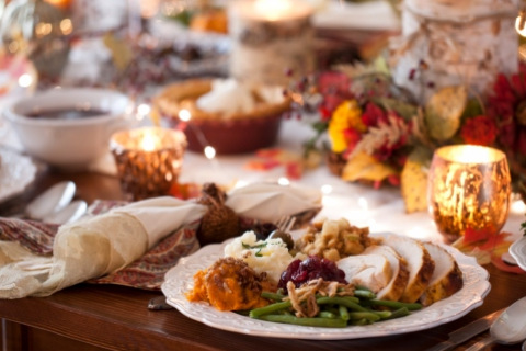 Festive Thanksgiving meal with candles